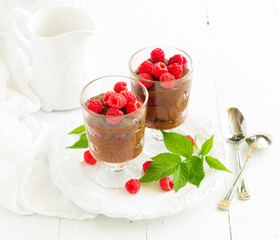 Chocolate mousse with raspberries. Selective focus.