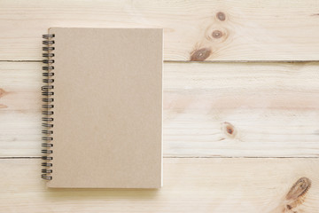 Book cover on textured wood background.