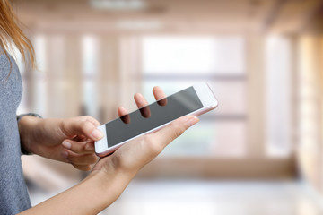 Young asian woman using smartphone