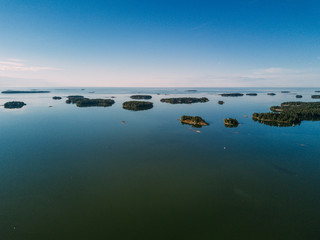 Obraz na płótnie Canvas Aerial view of Rocky island in a fjord of Sweden. Stockholm archipelago