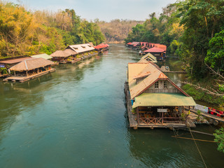 Fototapeta na wymiar floating resort and rafts in the both side of River Kwai near Sai Yok Yai waterfall.
