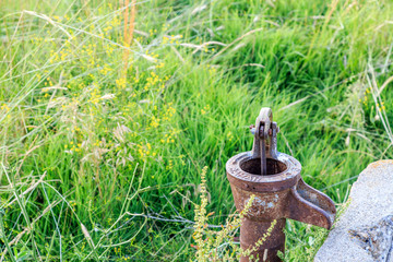 Rusted retro water pump near Denizli area in Turkey