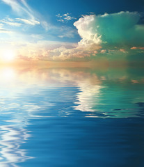 Obraz na płótnie Canvas Sky background and water reflection. Element of design.