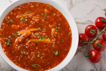 Tomato summer soup with rice and carrot