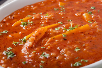 Tomato soup with rice and parsley