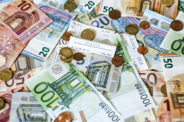 savings Cash money concept euro banknotes all sizes and cent coins on desk bill pay store text sum total save