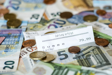 savings Cash money concept euro banknotes all sizes and cent coins on desk bill pay store text sum total save