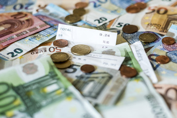 savings Cash money concept euro banknotes all sizes and cent coins on desk bill pay store text sum total save