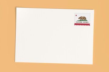 Letter Or Postcard From US States: Blank White Card with California Flag Postage Stamp, 3d Illustration On Wooden Color