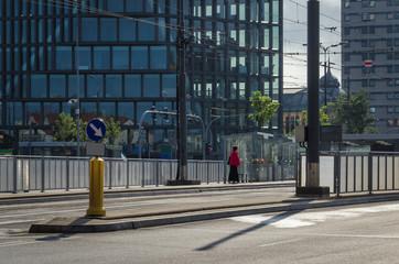 MAN IN THE CITY - Modern city surrounding a single man