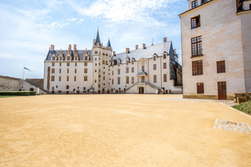 View on the castle of Dukes of Brittany during the sunny weather in Nantes city in France