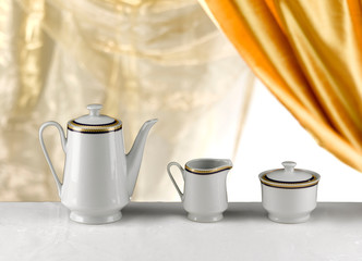 Obraz na płótnie Canvas porcelain sugar and milk holder and coffee pot