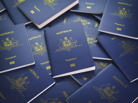 Passports Of Australia Background. Immigration Or Travel Concept. Pile Of Australian Passports.