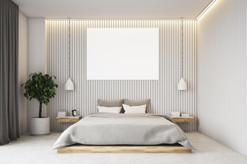 Beige bedroom with a poster