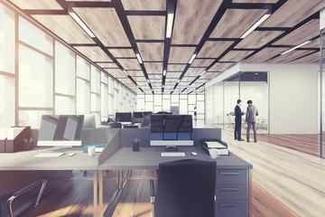 Wooden floor open space office, closeup, men