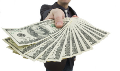 Businessman holding a fan of notes for one hundred dollars