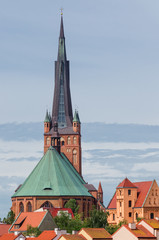 CHURCH - Tower of the church over the roofs of town houses in Szczecin