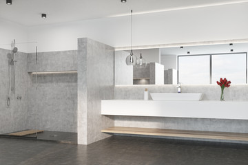 Gray bathroom with a shower, sink