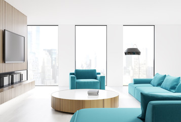 White living room interior, blue sofa