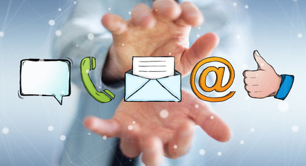 Businessman holding manuscript contact icon in his hand