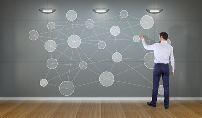 Businessman using social network interface on a wall 3D rendering