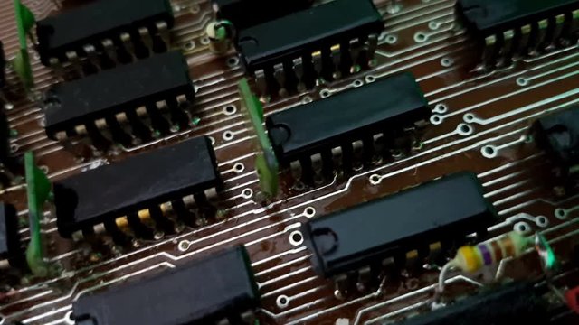 Close-up of an electronic board with microcircuits.  