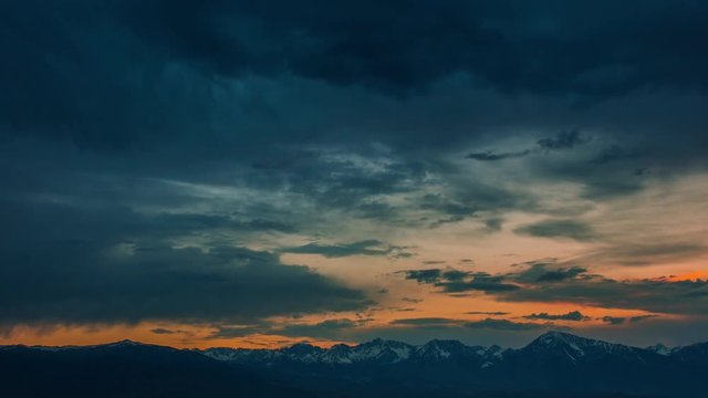 Time Lapse - Sunset with Beautiful Cloudscape and Snow-capped Mountain - 4K