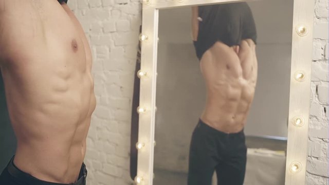 Shirtless muscular handsome young man