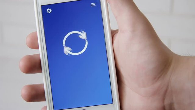 Join us concept application on the smartphone. Man uses mobile app.