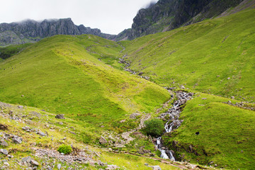 Lake District National Park, path to Scafell Pike, view of the mountains, stream, England,...