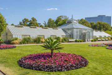 Greenhouses in a flowering garden at the Public Garden Society of Gothenburg