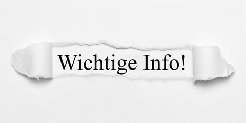 Wichtige Info! auf weißen gerissenen Papier