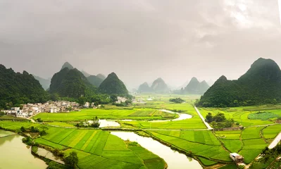 Schilderijen op glas Stunning rice field view with karst formations China © creativefamily