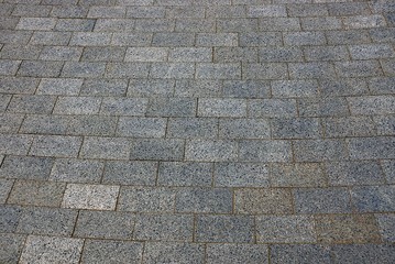 серая  текстура из каменных кирпичей тротуара
