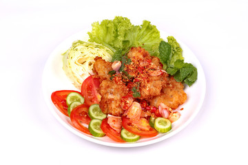 Spicy crispy deep-fried chicken salad.