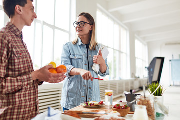Creative people preparing food for shooting in studio