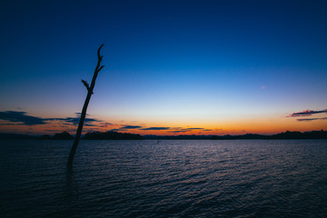 Sunset behind the lake