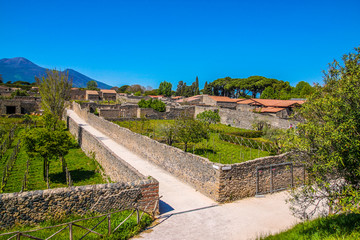 Fototapeta na wymiar ancient Pompeii ruins, UNESCO World Heritage Site, Campania region, Italy. Pompeii city destroyed in 79BC by the eruption of Mount Vesuvius