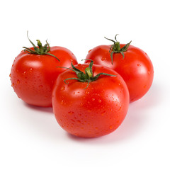 Red fresh tomatoes on a white isolated background
