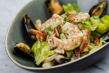 Seafood salad with shrimps, calamari and mussels