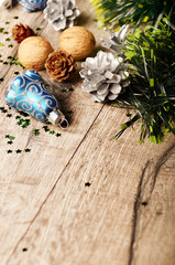 Christmas background of nuts stripes and decorations