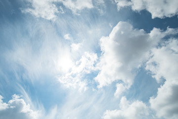 Blue sky with fluffy cloud, natural background.