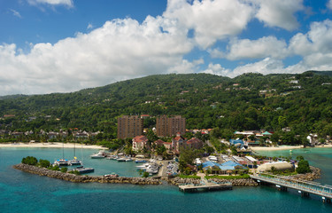 Fototapeta na wymiar Panorama of port in Ocho Rios in Jamaica from the sea