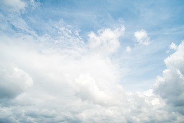 Blue sky with fluffy cloud, natural background.