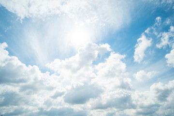 Blue sky with fluffy cloud, natural background.
