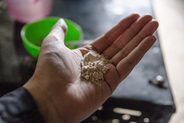 Indian horlicks powder in left palm in grocery store at Thangu and Chopta valley in winter in Lachen. North Sikkim, India. 