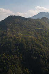 Naklejka premium the peaceful village on the beautiful forest mountain