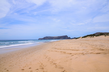 Fototapeta na wymiar Beach at Porto Santo Island looking south towards Ilheu da Cal