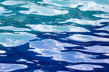 The smooth water in the pool as a background