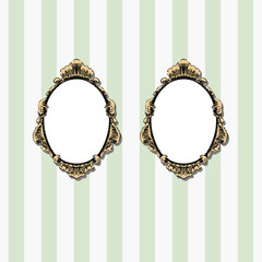 Two retro oval frames hanging on the wall. - 163569081